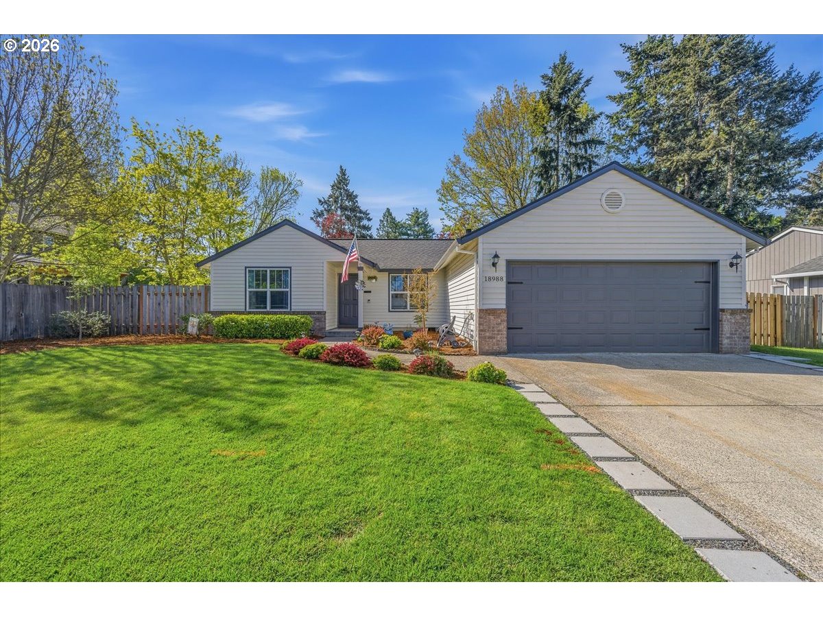 18988 Southwest Pike Lane Beaverton, OR 97078 - Photo 1 of 36 a aerial view of a house with yard and green space