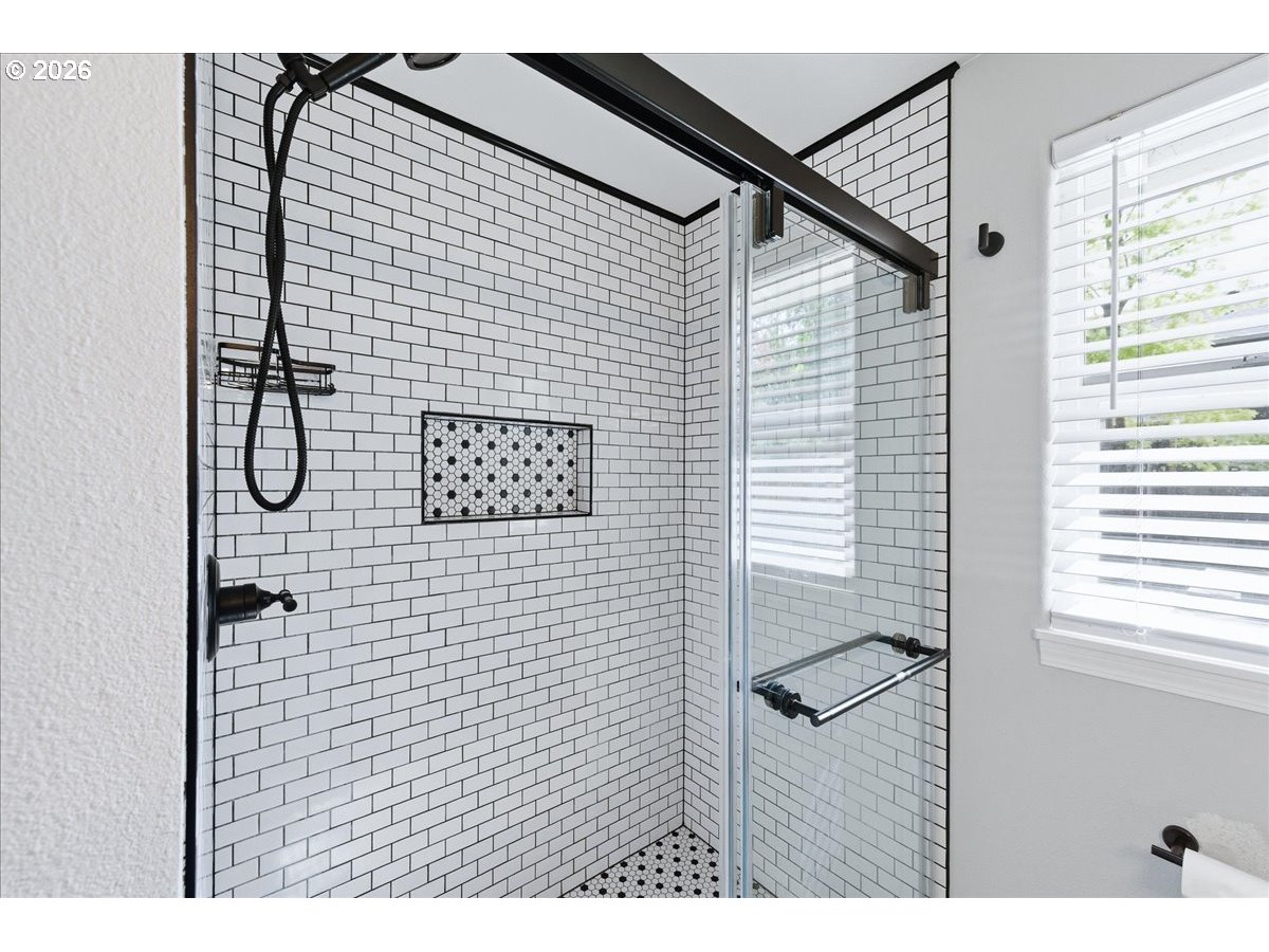 18988 Southwest Pike Lane Beaverton, OR 97078 - Photo 26 of 36 a bathroom with a shower