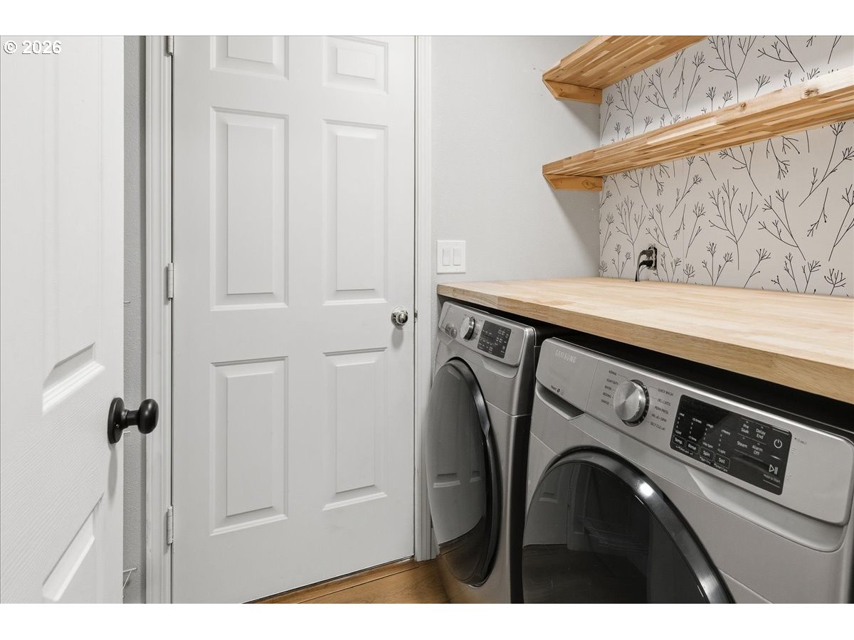 18988 Southwest Pike Lane Beaverton, OR 97078 - Photo 27 of 36 a utility room with dryer and washer