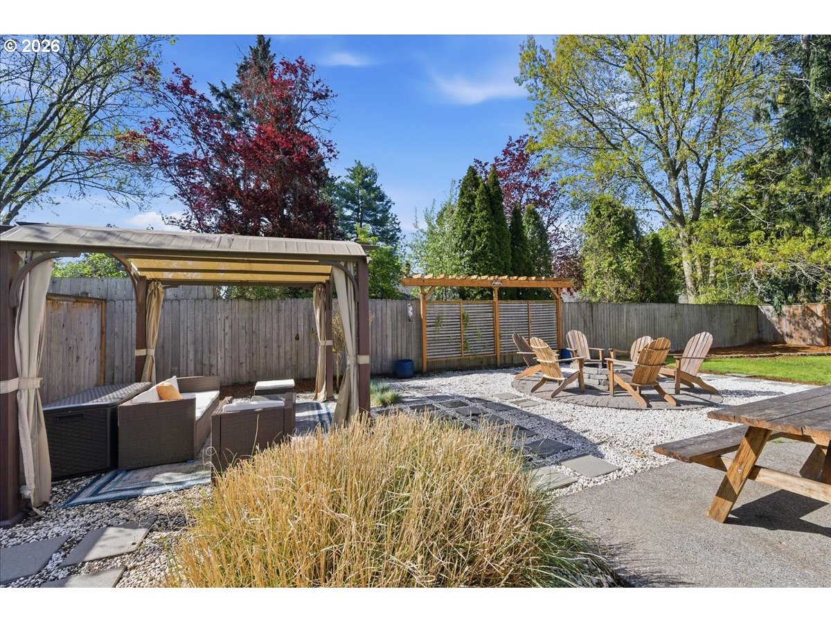 18988 Southwest Pike Lane Beaverton, OR 97078 - Photo 28 of 36 a view of a backyard with sitting area and furniture