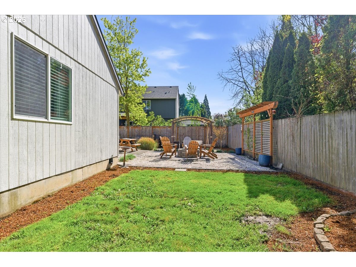 18988 Southwest Pike Lane Beaverton, OR 97078 - Photo 31 of 36 a view of a house with backyard and sitting area