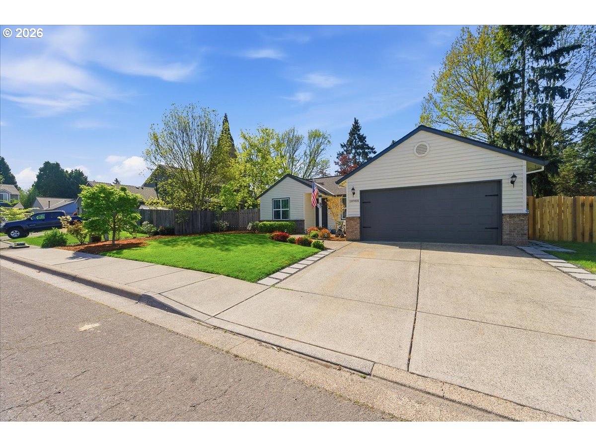 18988 Southwest Pike Lane Beaverton, OR 97078 - Photo 35 of 36 a house with yard and a outdoor space