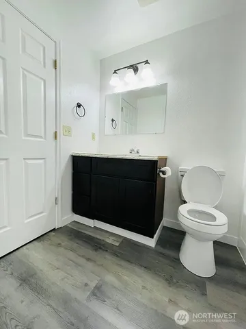 a bathroom with a sink and a toilet