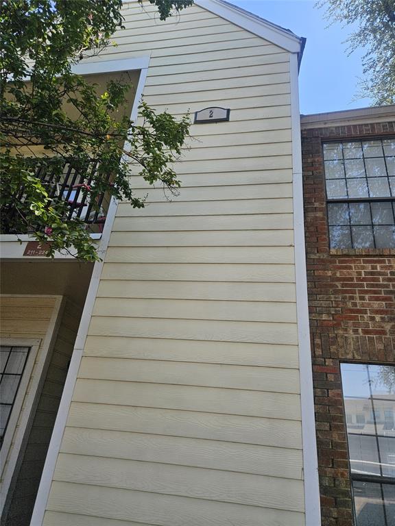 9601 Forest Lane, Unit 224 Dallas, TX 75243 - Photo 3 of 17 a view of a pathway with a house