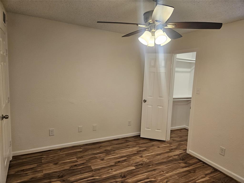 9601 Forest Lane, Unit 224 Dallas, TX 75243 - Photo 4 of 17 a view of an empty room with a window