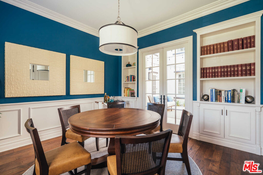 25311 Prado De Ambar Calabasas, CA 91302 - Photo 11 of 58 a view of a dining room with furniture window and wooden floor