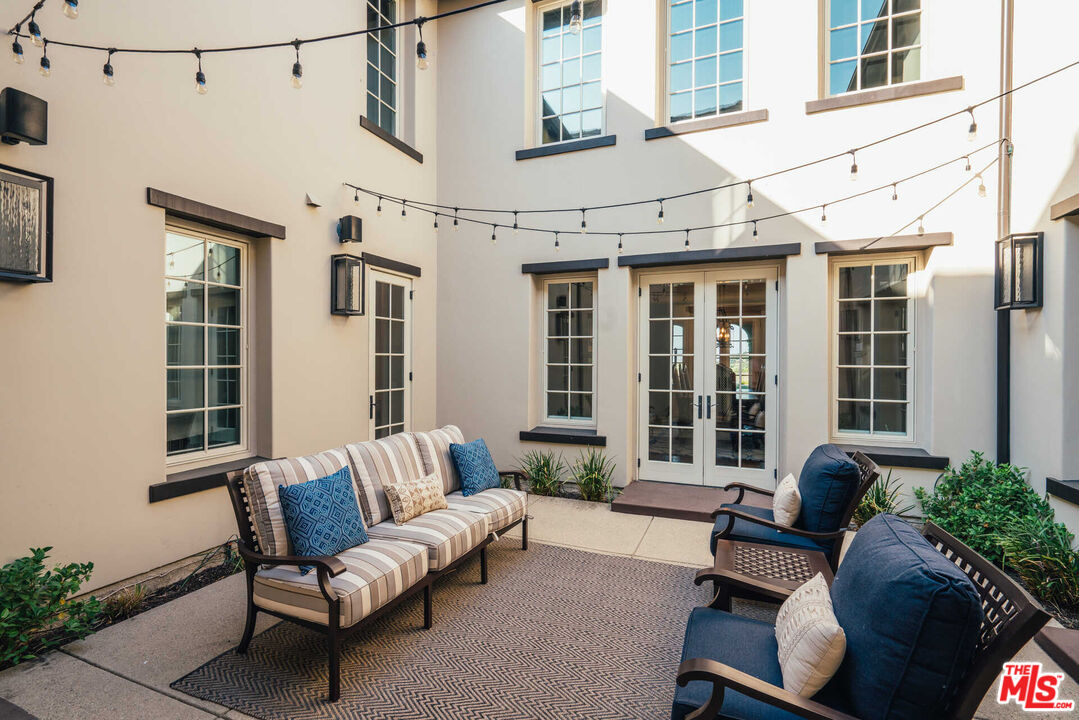 25311 Prado De Ambar Calabasas, CA 91302 - Photo 12 of 58 a building outdoor space with patio furniture