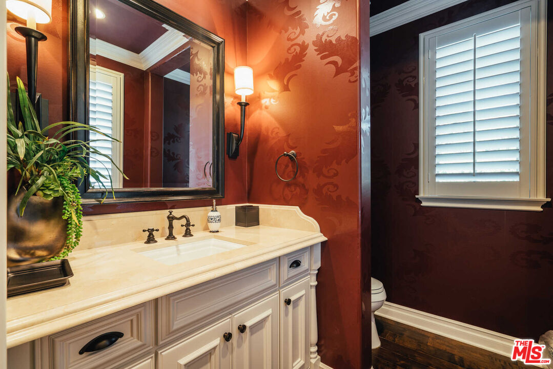 25311 Prado De Ambar Calabasas, CA 91302 - Photo 13 of 58 a bathroom with a sink and a mirror
