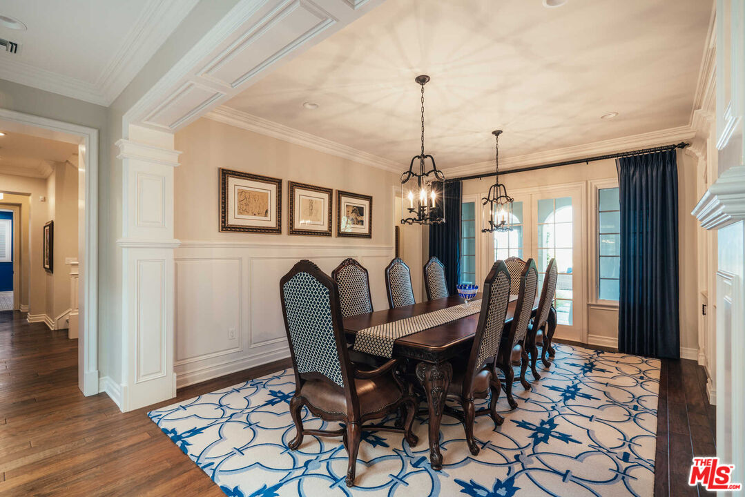 25311 Prado De Ambar Calabasas, CA 91302 - Photo 14 of 58 a view of a dining room with furniture window and wooden floor