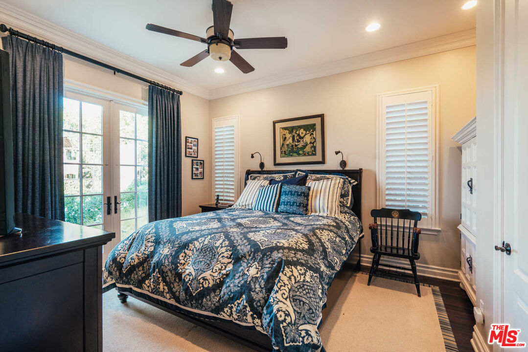 25311 Prado De Ambar Calabasas, CA 91302 - Photo 21 of 58 a bedroom with a bed and a window