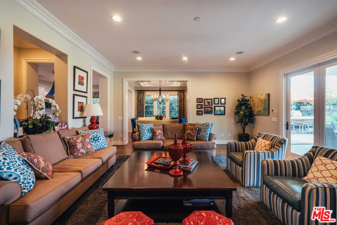 25311 Prado De Ambar Calabasas, CA 91302 - Photo 26 of 58 a living room with furniture and a large window