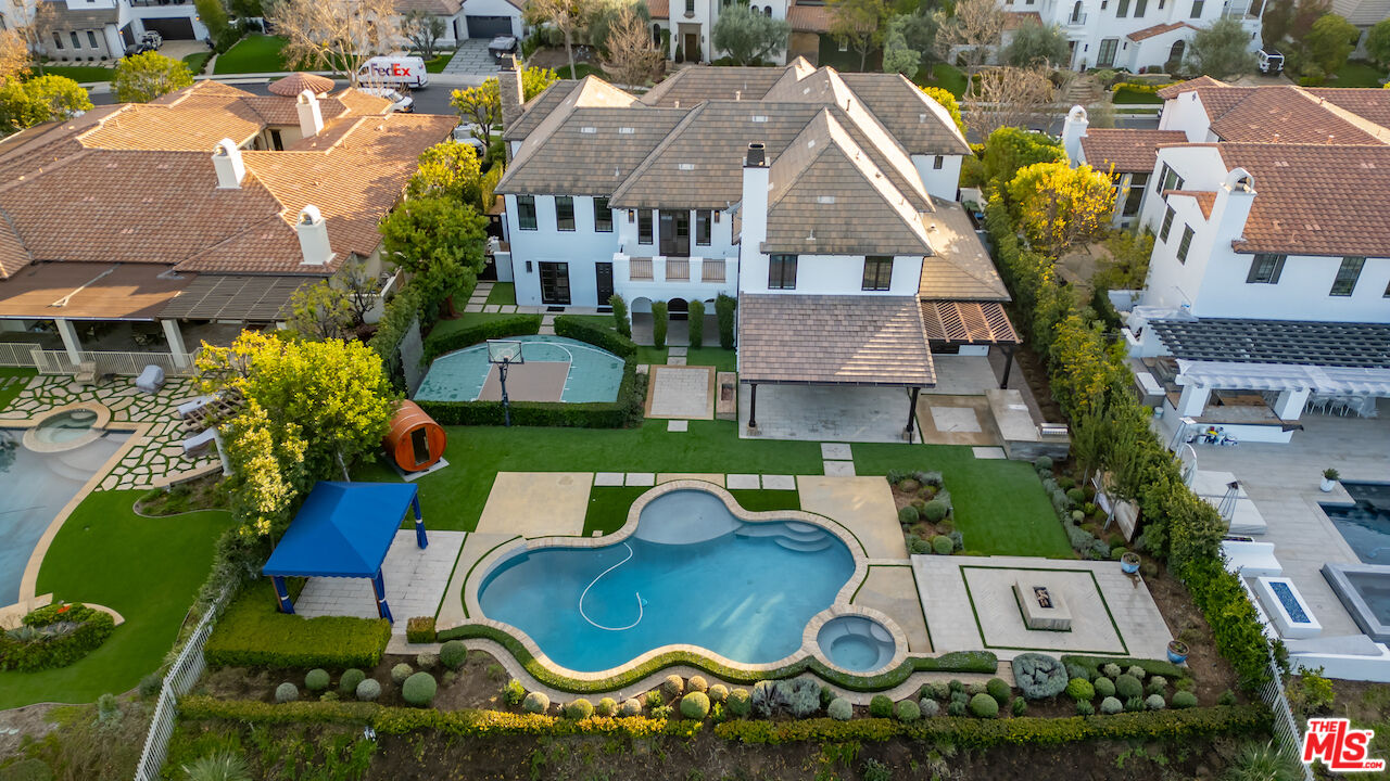25311 Prado De Ambar Calabasas, CA 91302 - Photo 4 of 58 an aerial view of a house with garden space and street view