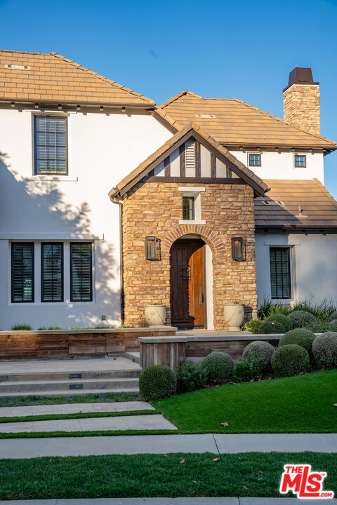 25311 Prado De Ambar Calabasas, CA 91302 - Photo 5 of 58 a front view of a house