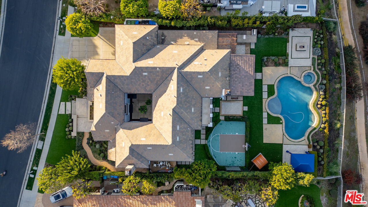 25311 Prado De Ambar Calabasas, CA 91302 - Photo 54 of 58 an aerial view of house with yard swimming pool and outdoor seating