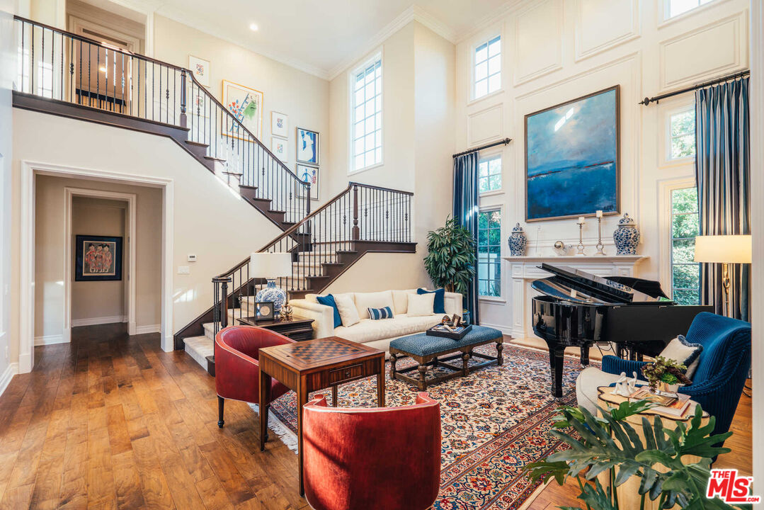 25311 Prado De Ambar Calabasas, CA 91302 - Photo 7 of 58 a living room with furniture and a chandelier