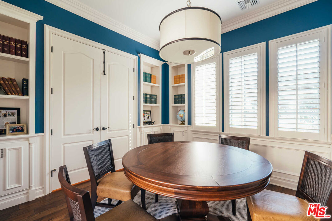 25311 Prado De Ambar Calabasas, CA 91302 - Photo 10 of 58 a view of a dining room with furniture window and wooden floor