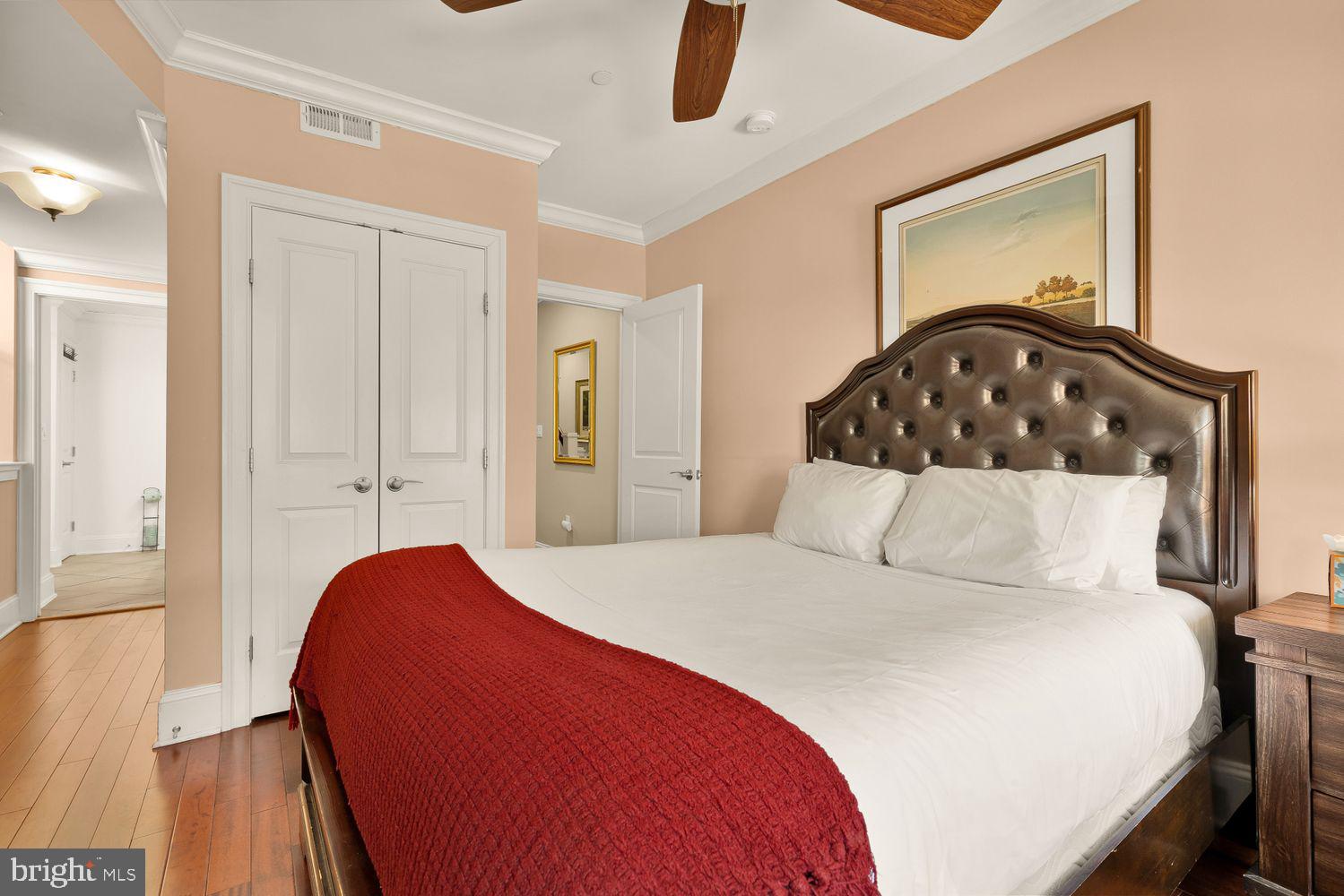 2814 13th Street Northwest Washington, DC 20009 - Photo 16 of 35 a bedroom with a bed and wooden floor