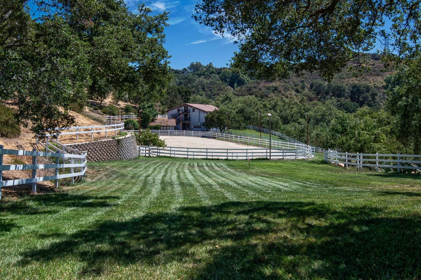 22344 Regnart Road Cupertino, CA 95014 - Photo 1 of 20 a view of a house with a yard