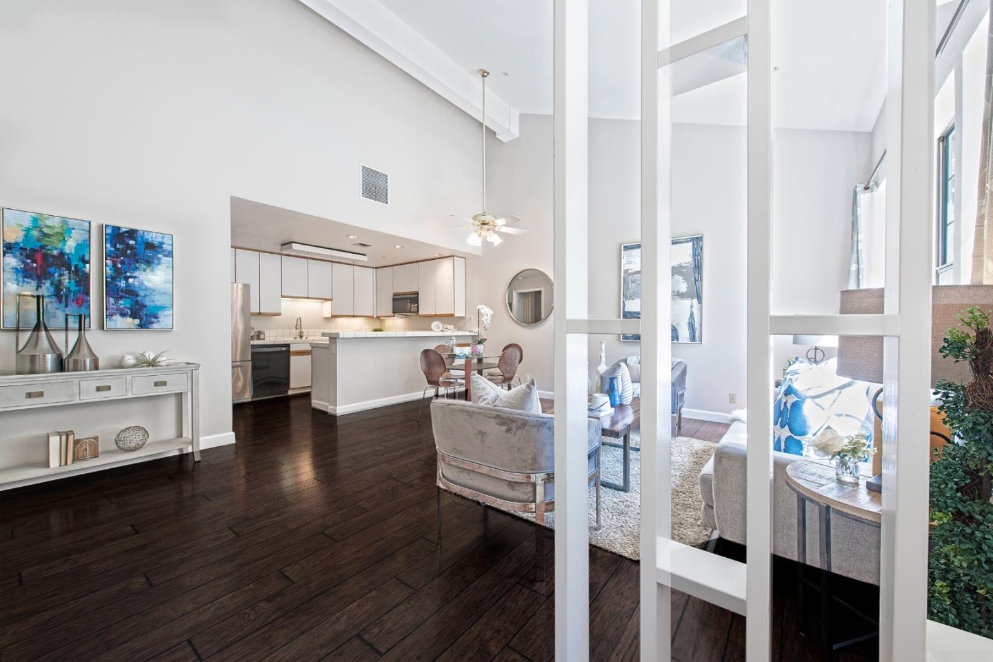 22344 Regnart Road Cupertino, CA 95014 - Photo 13 of 20 a view of living room with furniture and wooden floor