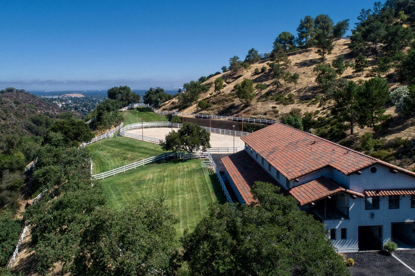 22344 Regnart Road Cupertino, CA 95014 - Photo 2 of 20 an aerial view of house with yard swimming pool and outdoor seating