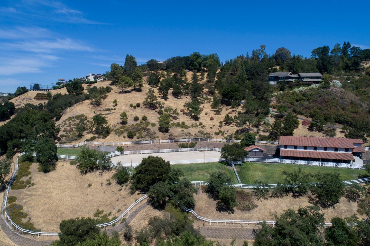 22344 Regnart Road Cupertino, CA 95014 - Photo 8 of 20 a view of a park with large trees