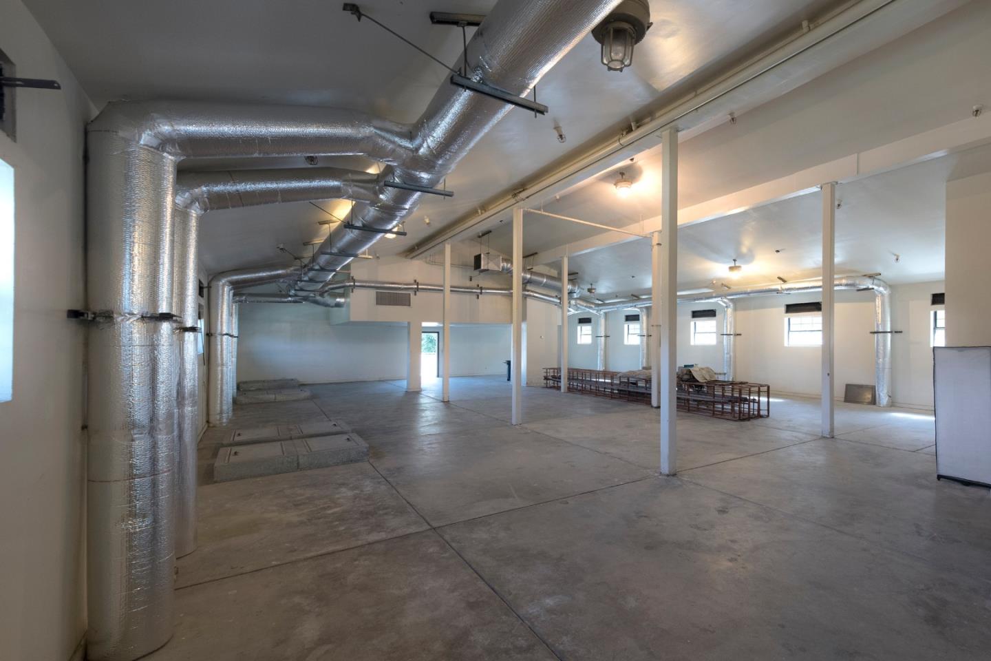 22344 Regnart Road Cupertino, CA 95014 - Photo 9 of 20 a view of a room with gym equipment