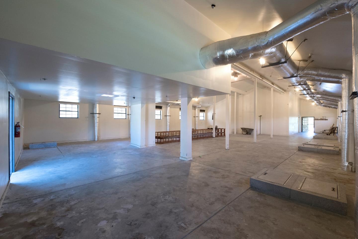 22344 Regnart Road Cupertino, CA 95014 - Photo 10 of 20 a view of a hallway with wooden floor