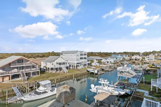 $900,000 | 135 Starfish Drive, Holden Beach, NC 28462