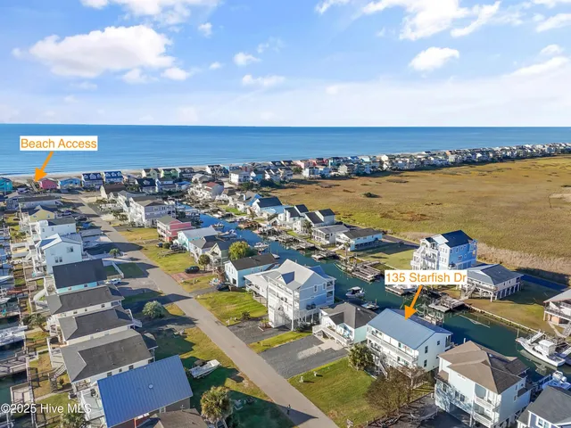 $900,000 | 135 Starfish Drive, Holden Beach, NC 28462