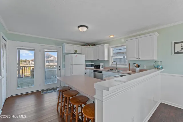 $900,000 | 135 Starfish Drive, Holden Beach, NC 28462