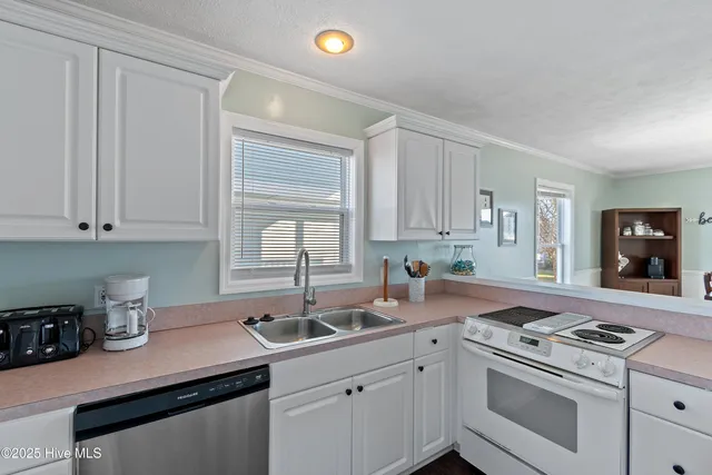 $900,000 | 135 Starfish Drive, Holden Beach, NC 28462