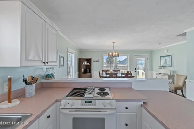 $900,000 | 135 Starfish Drive, Holden Beach, NC 28462