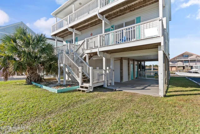 $900,000 | 135 Starfish Drive, Holden Beach, NC 28462