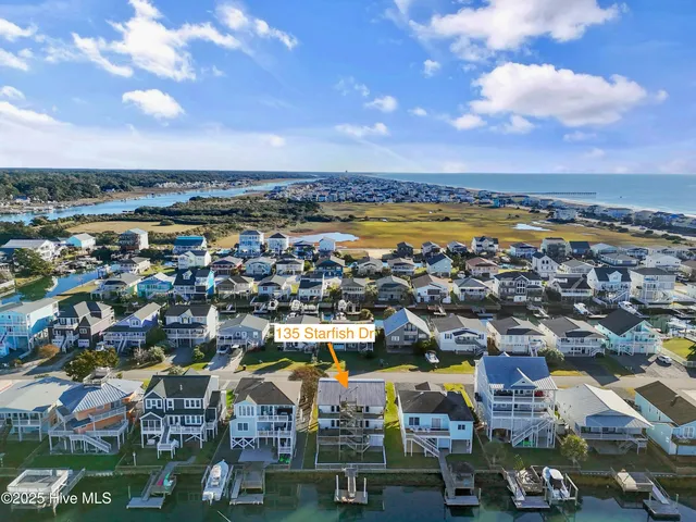 $900,000 | 135 Starfish Drive, Holden Beach, NC 28462