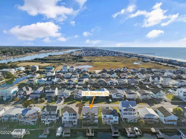 $900,000 | 135 Starfish Drive, Holden Beach, NC 28462