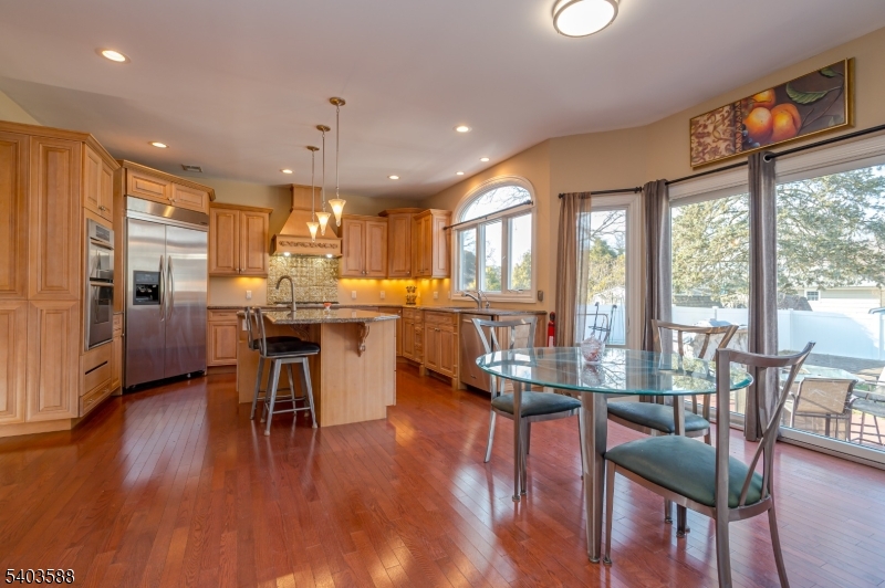 53 Princeton Avenue Woodbridge, NJ 07067 - Photo 11 of 37 a view of a dining room with furniture window and wooden floor