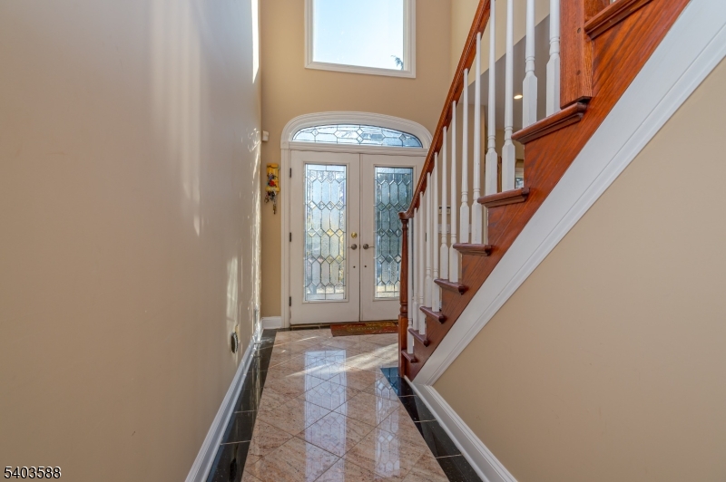 53 Princeton Avenue Woodbridge, NJ 07067 - Photo 23 of 37 a view of an entryway with staircase