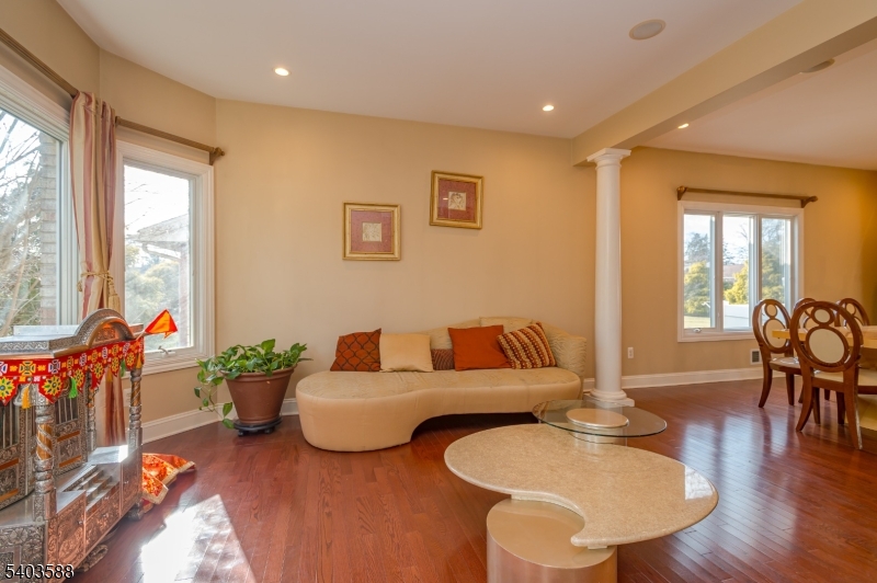 53 Princeton Avenue Woodbridge, NJ 07067 - Photo 3 of 37 a living room with furniture and wooden floor