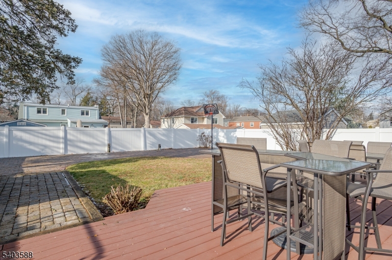 53 Princeton Avenue Woodbridge, NJ 07067 - Photo 36 of 37 a view of a swimming pool with a patio