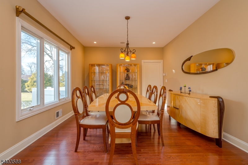 53 Princeton Avenue Woodbridge, NJ 07067 - Photo 4 of 37 a view of a dining room with furniture window and wooden floor