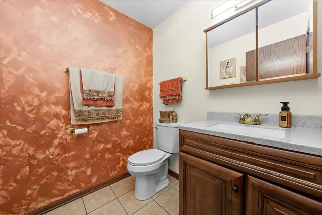 a bathroom with a toilet and a sink