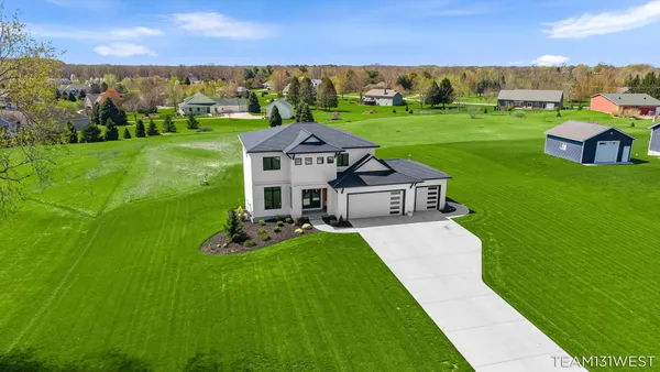 $735,000 | 13273 Jessann Drive, Coopersville, MI 49404