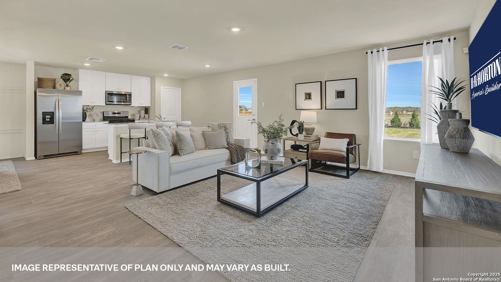 188 Surrey Oaks Maxwell, TX 78656 - Photo 4 of 35 a living room with furniture white walls and kitchen view