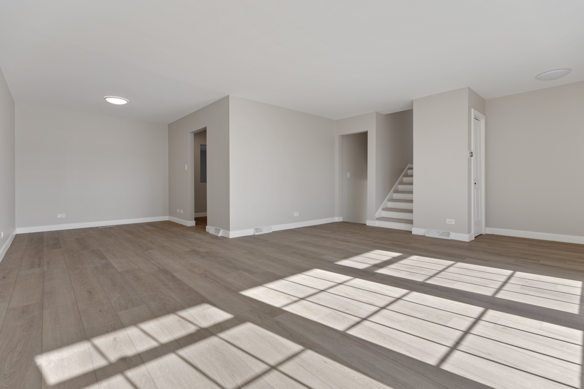 9446 Magnolia Avenue Mokena, IL 60448 - Photo 14 of 38 a view of a room with wooden floor and white walls