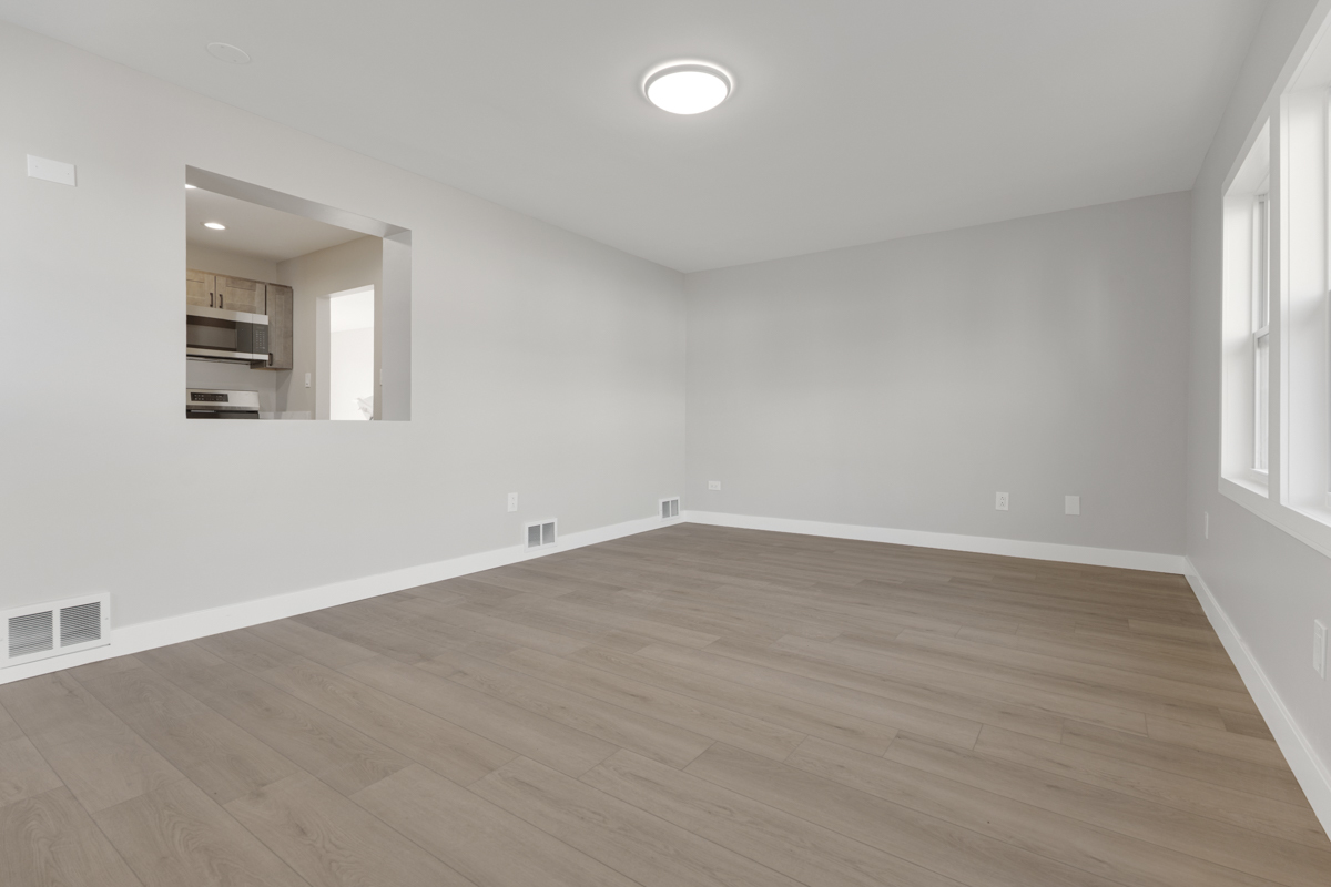 9446 Magnolia Avenue Mokena, IL 60448 - Photo 18 of 38 wooden floor in an empty room with a window