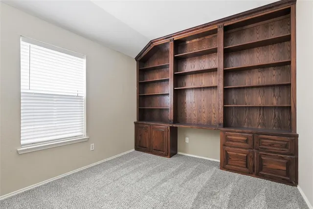 a room with furniture and a window