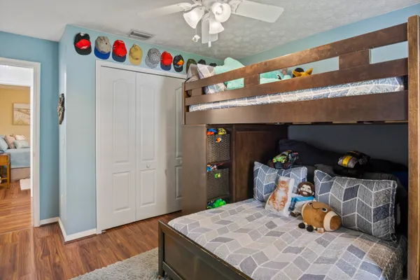 a room with toys and wooden floor
