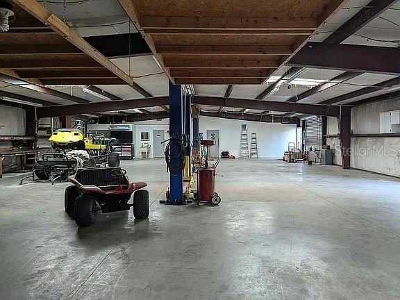 4402 Gallagher Road Plant City, FL 33565 - Photo 13 of 42 a view of parking garage with cars