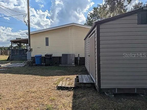 4402 Gallagher Road Plant City, FL 33565 - Photo 30 of 42 a view of a back yard of the house