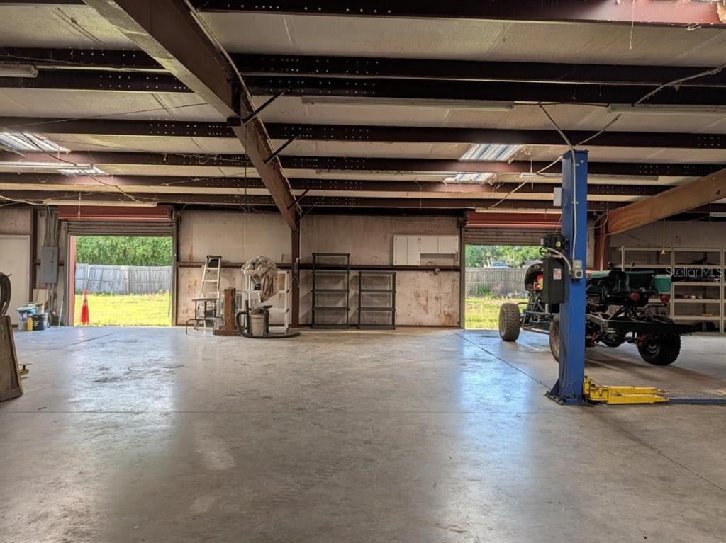4402 Gallagher Road Plant City, FL 33565 - Photo 3 of 42 a view of a garage with storage